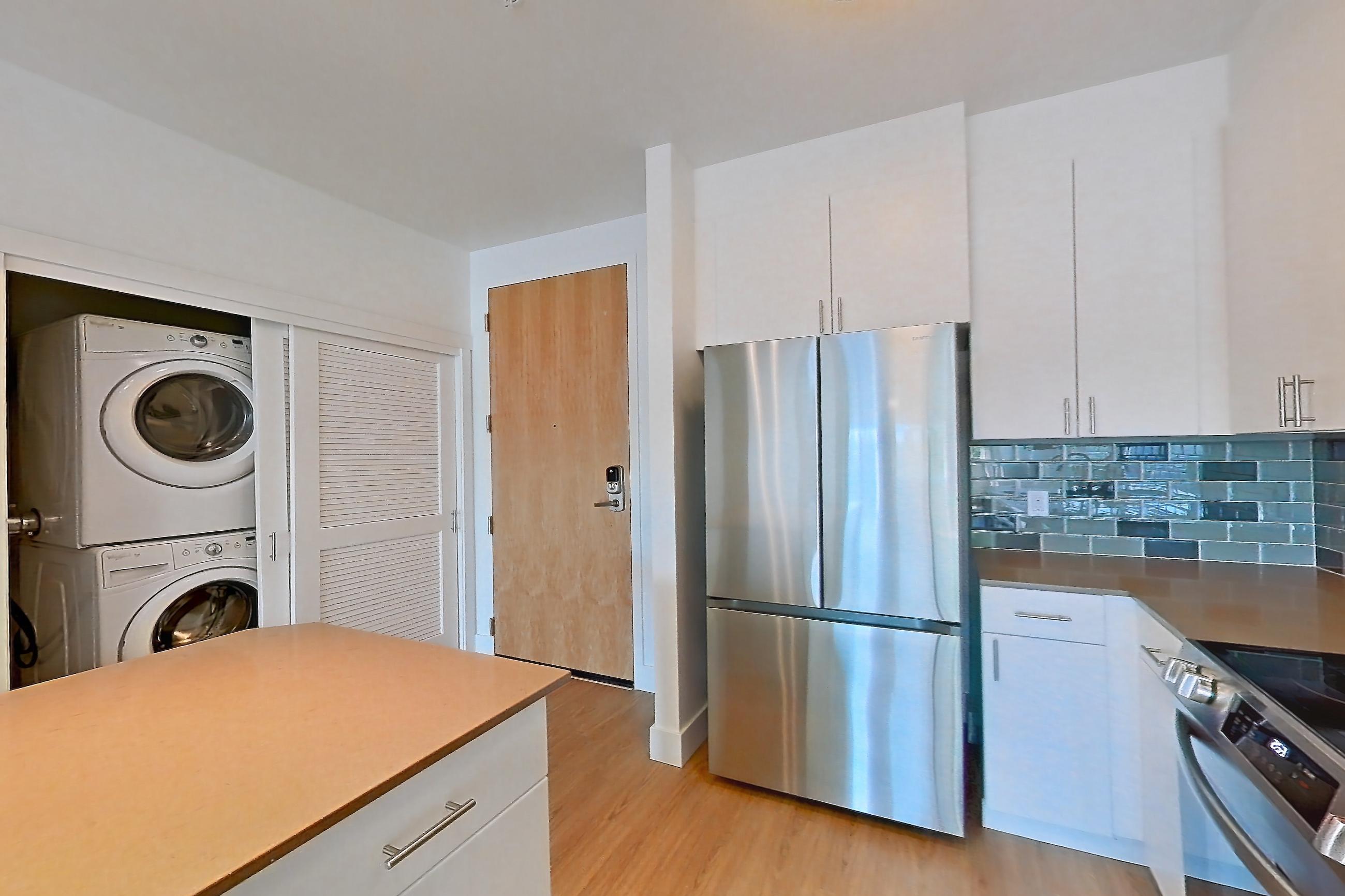 Kitchen in a A44 Premium floor plan unit, representative of Unit 226 at The Waymark