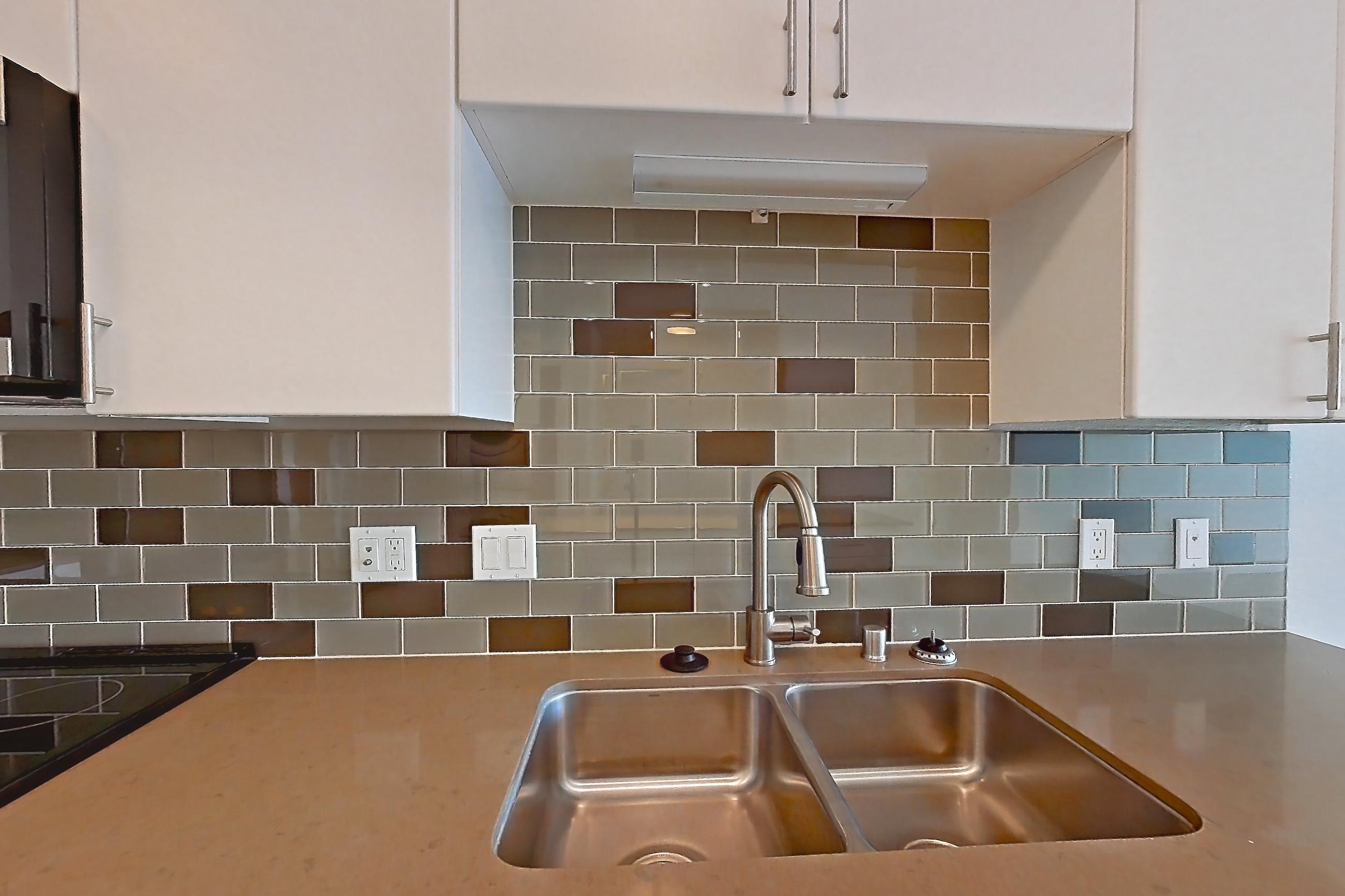 Kitchen in a A44 Premium floor plan unit, representative of Unit 226 at The Waymark