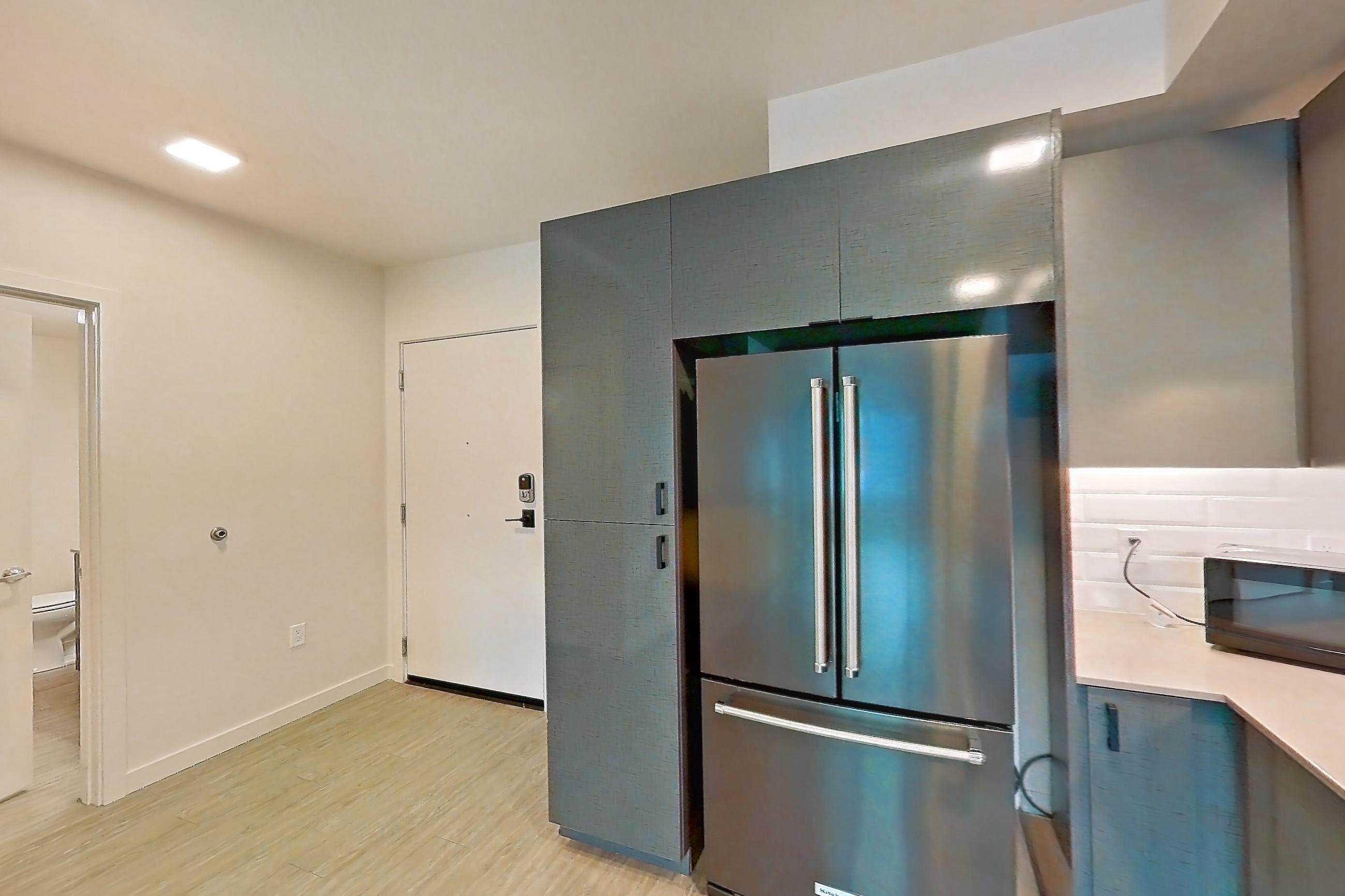 Kitchen in a U8 floor plan unit, representative of Unit 616W at Chroma