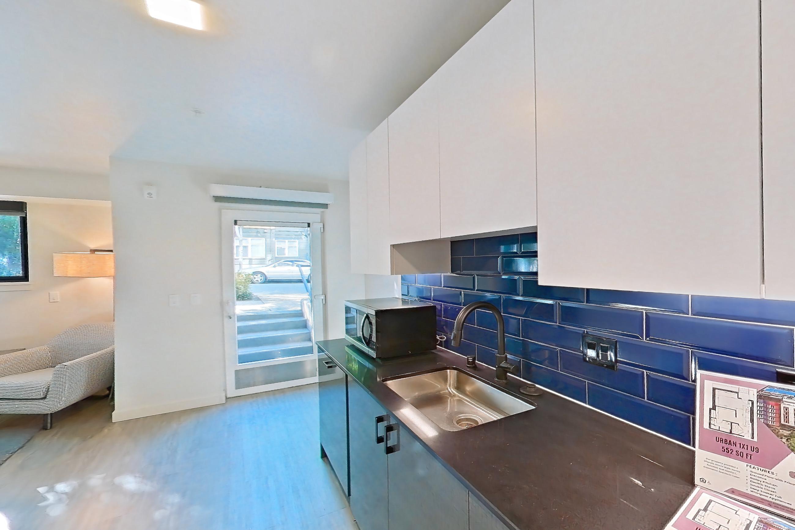 Kitchen in a U9 floor plan unit, representative of Unit 511 at Chroma