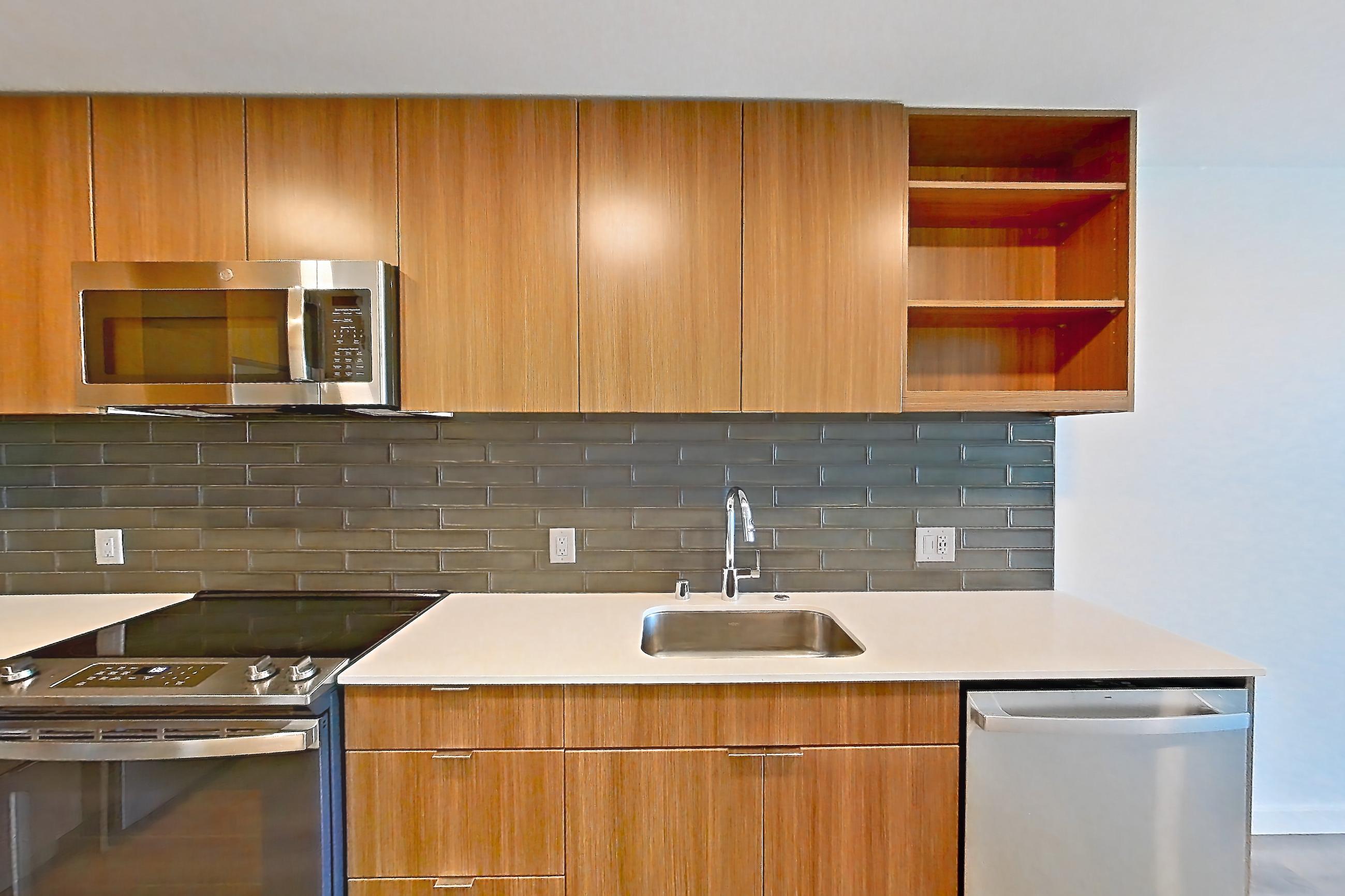 Kitchen in a B1.1 floor plan unit, representative of Unit 237 at Arlo