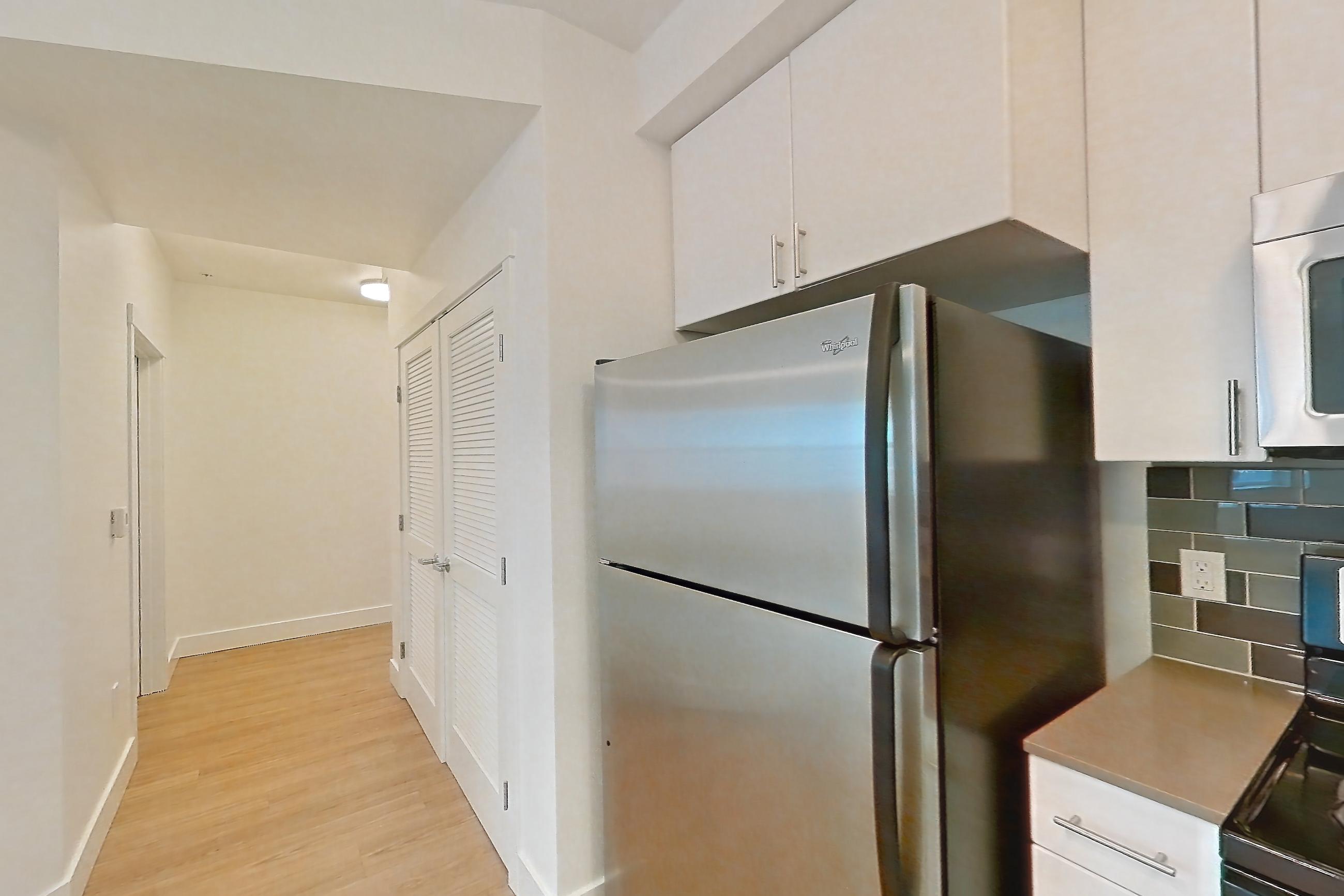 Kitchen in a S2 floor plan unit, representative of Unit 301 at The Waymark