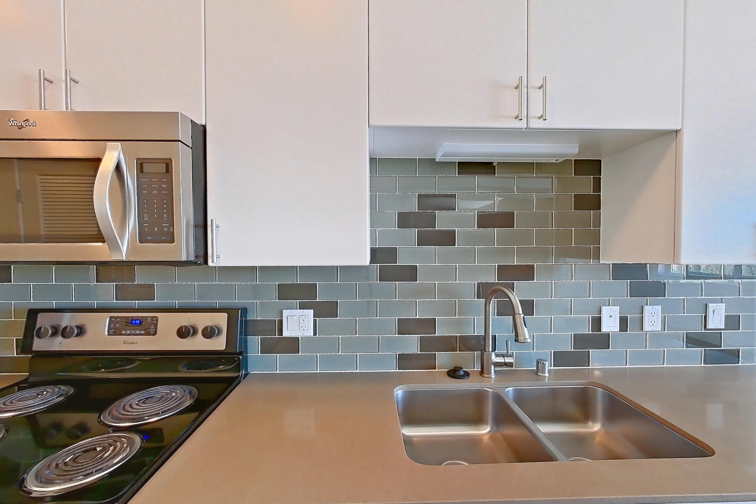 Kitchen in a UA2 floor plan unit, representative of Unit 425 at The Waymark