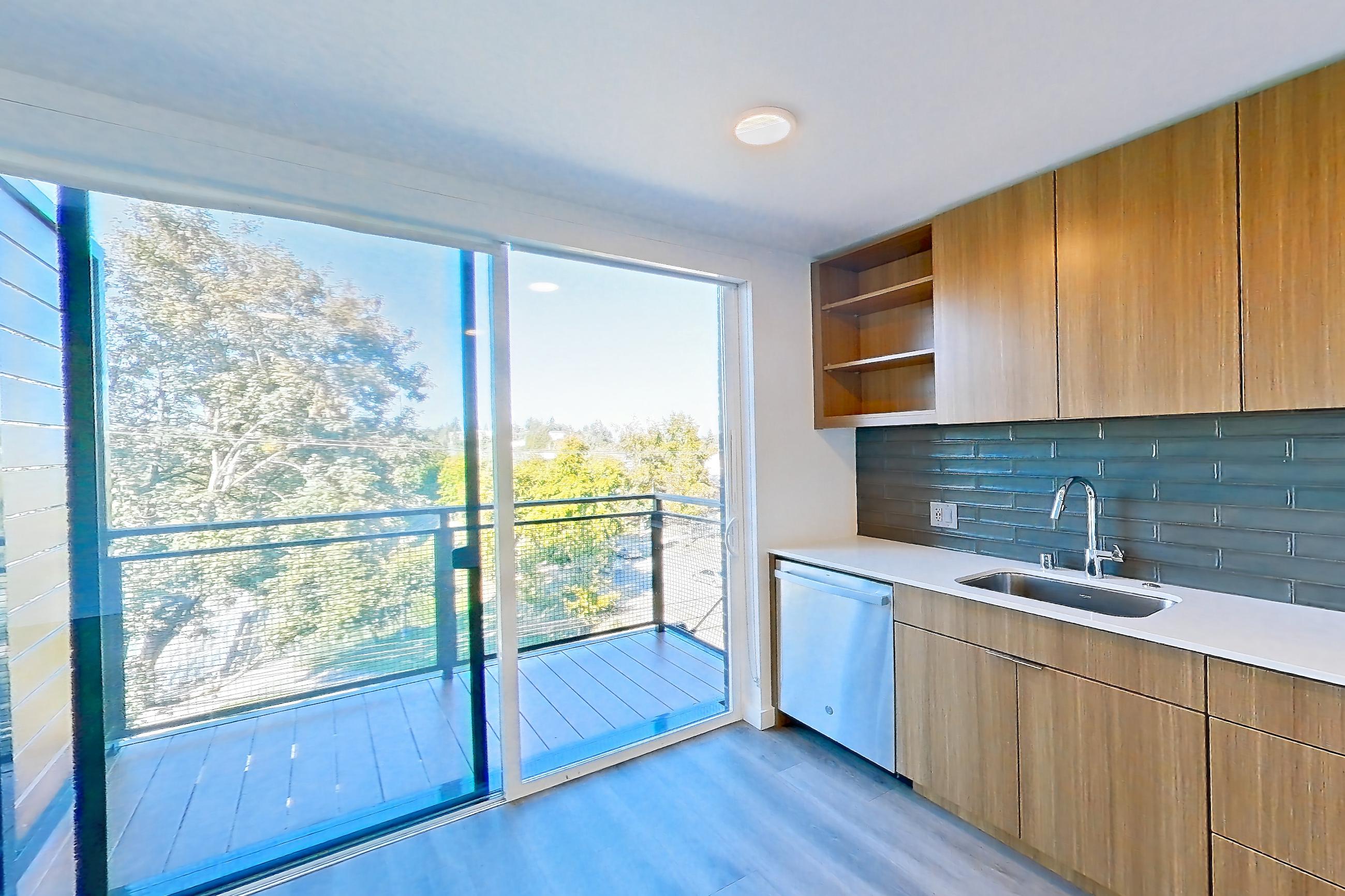 Kitchen in a C1.2 floor plan unit, representative of Unit 145 at Arlo