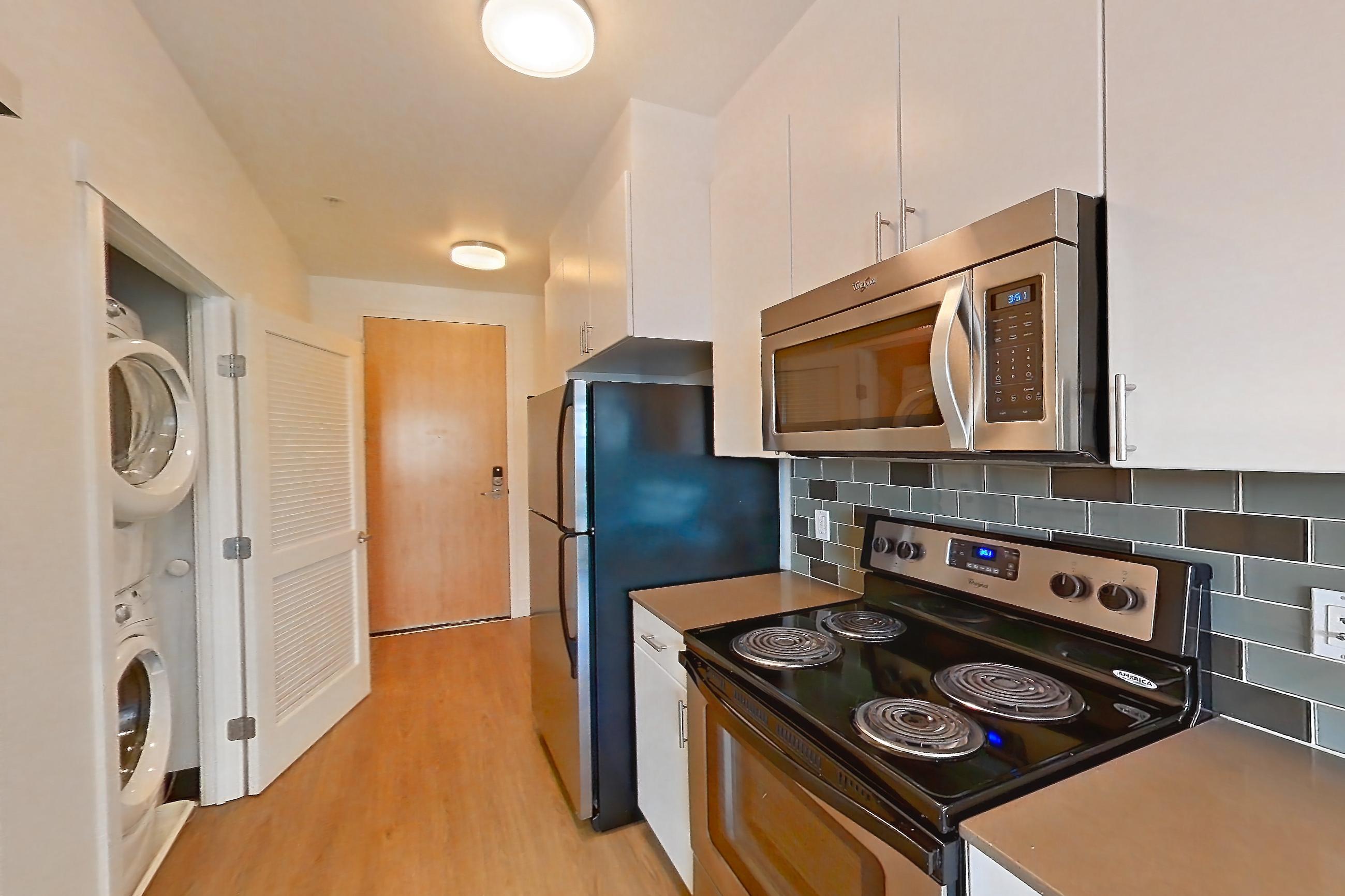 Kitchen in Apartment 423 at The Waymark, UA6 floor plan