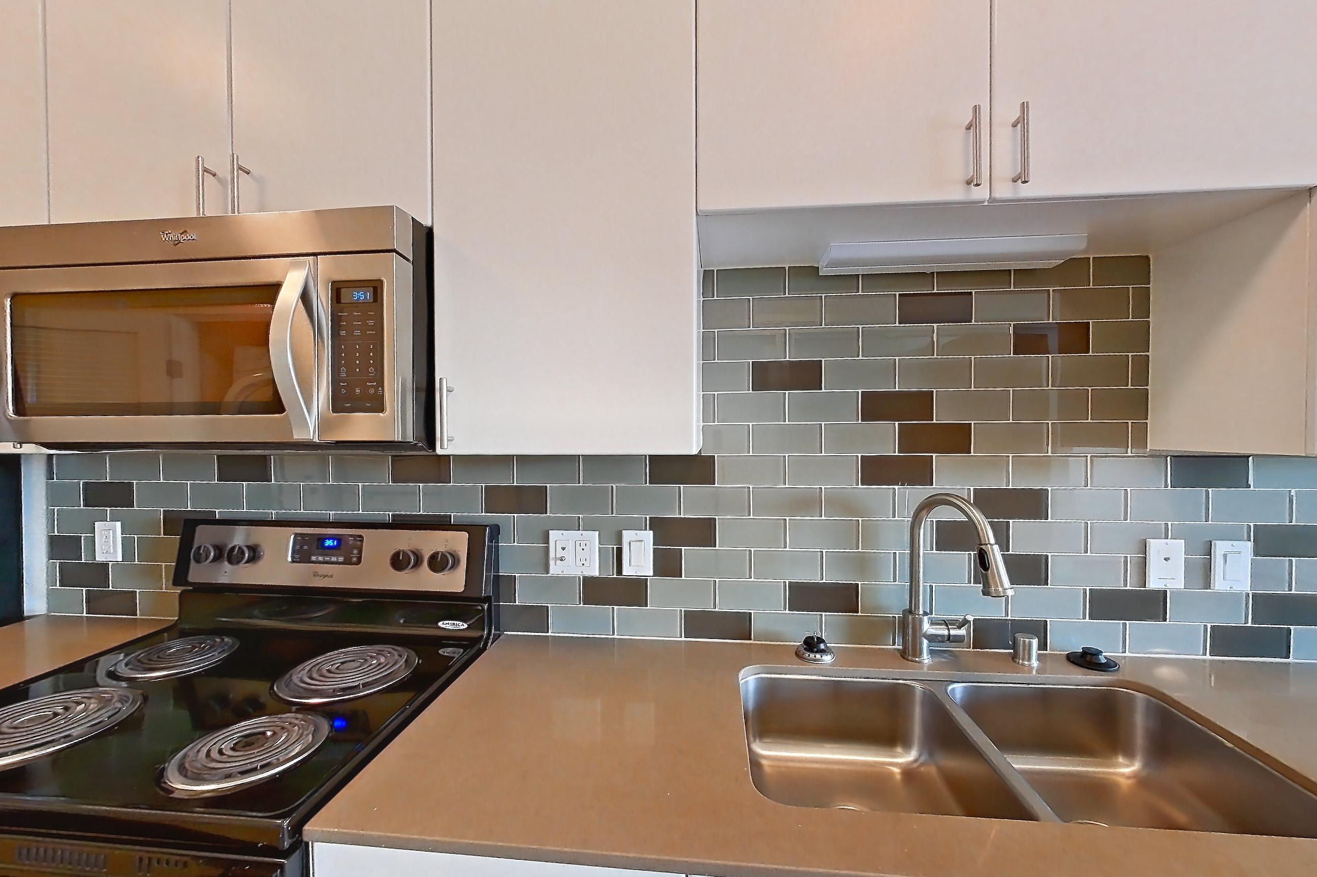 Kitchen in Apartment 423 at The Waymark, UA6 floor plan