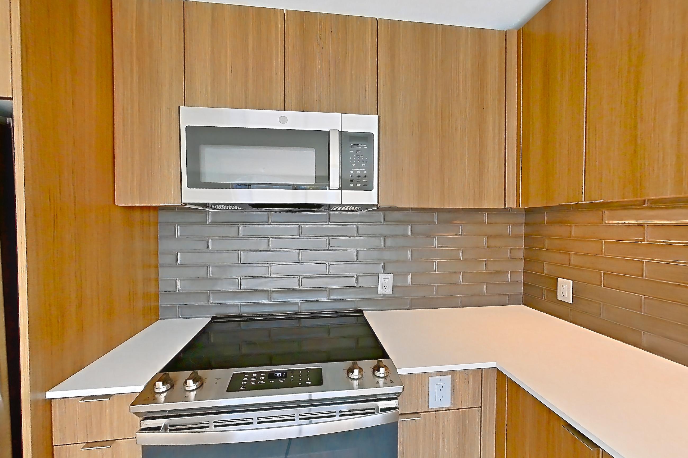 Kitchen in a C6 floor plan unit, representative of Unit 383 at Arlo