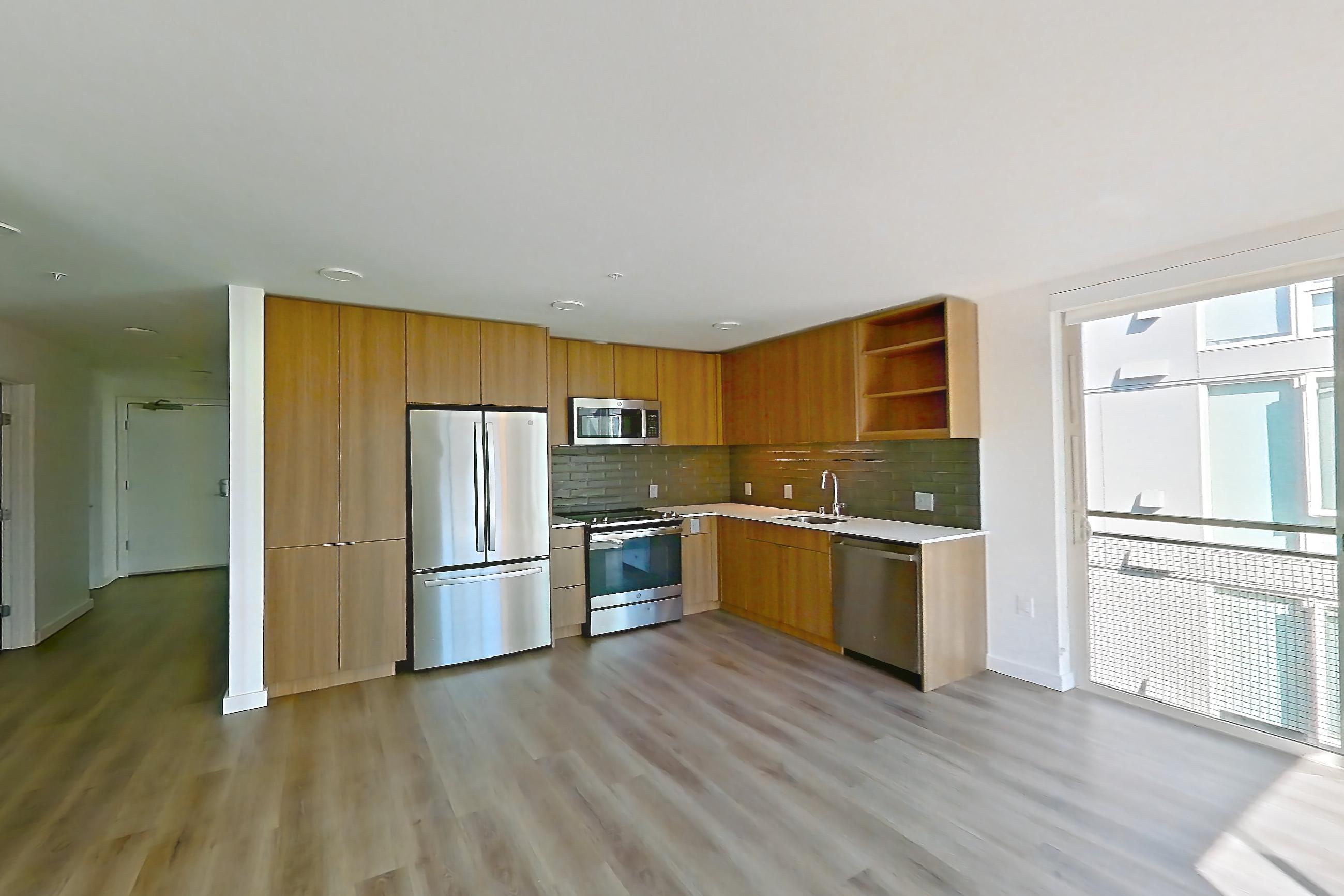 Living room in a C6 floor plan unit, representative of Unit 383 at Arlo