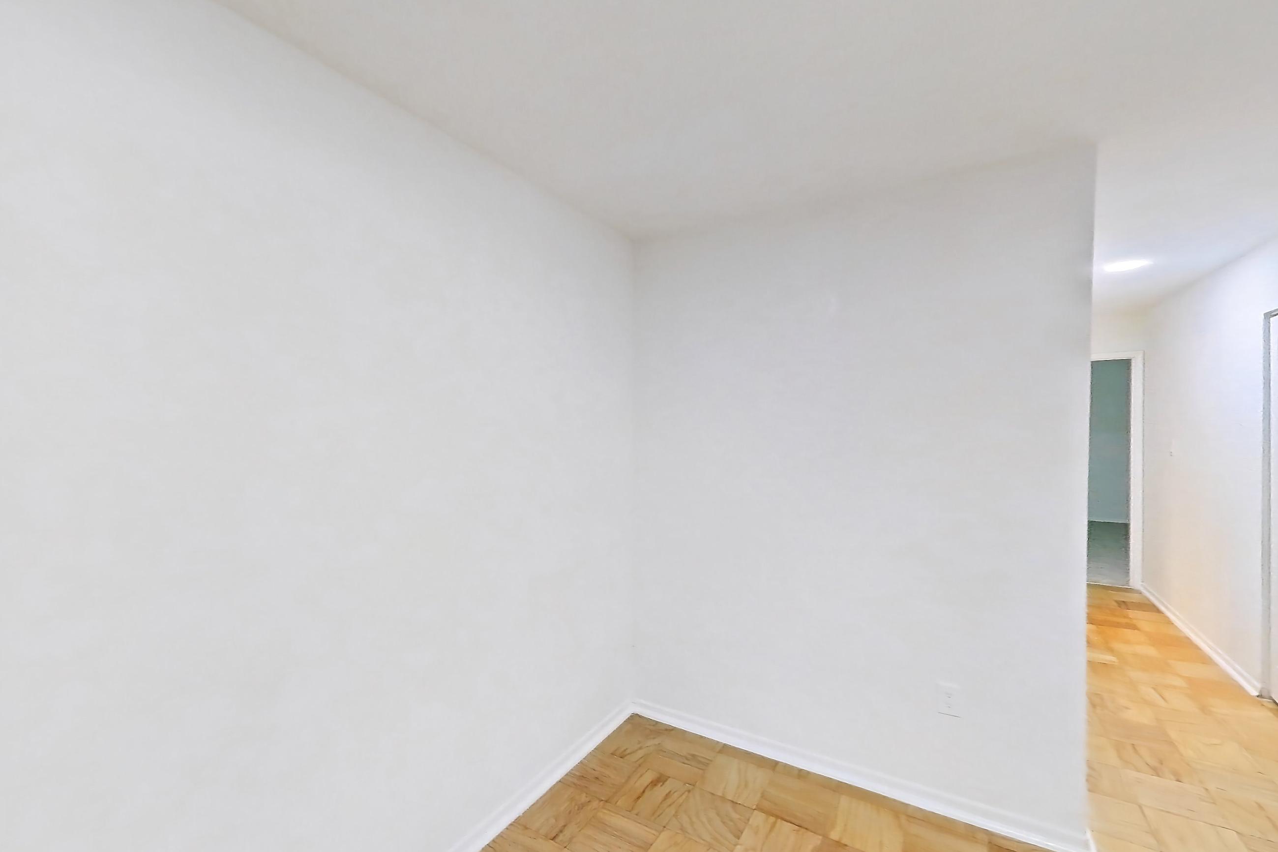 Dining room with light wood-finish flooring and parquet flooring, Apartment 5801CL32 at Franklin Park at Greenbelt Station