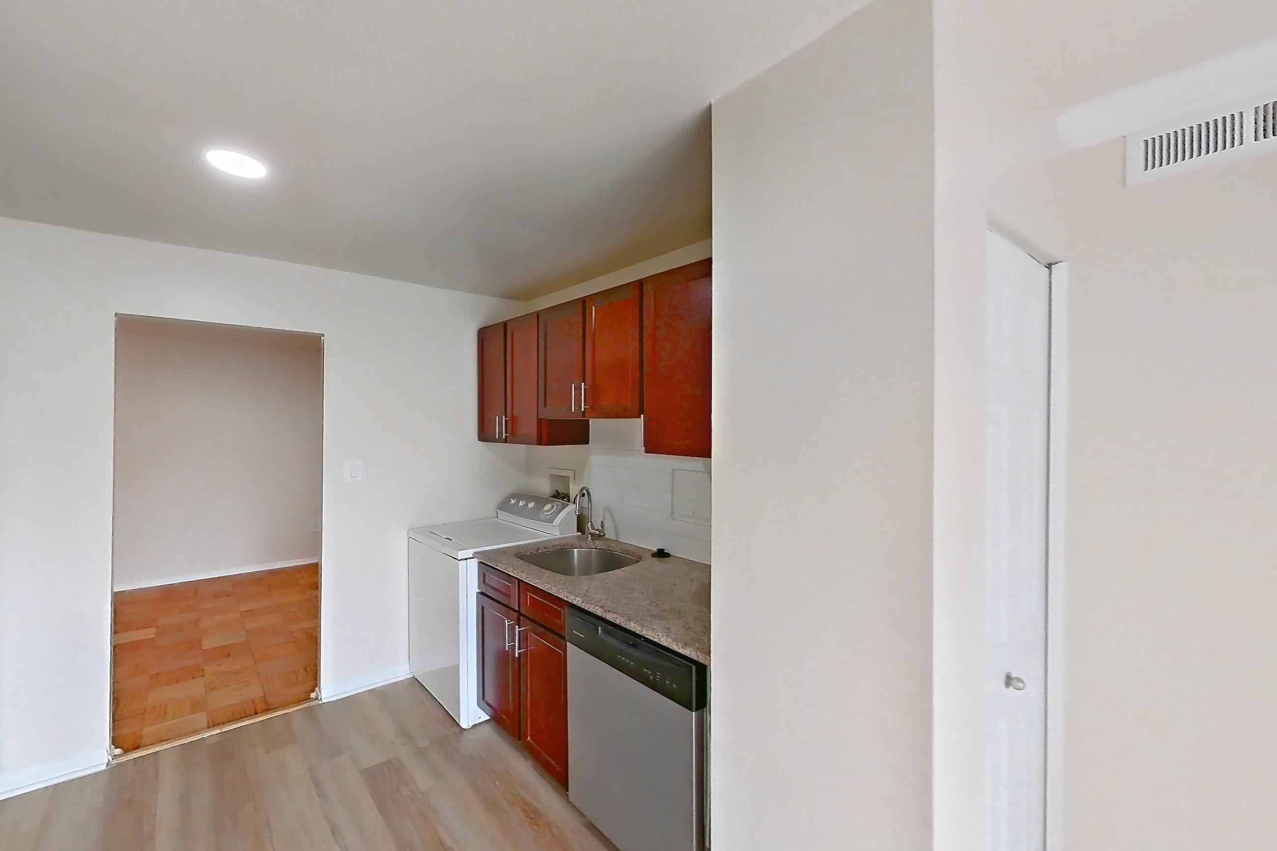 Kitchen in a Siberian floor plan apartment, representative of Apartment 9003BT23 at Franklin Park at Greenbelt Station