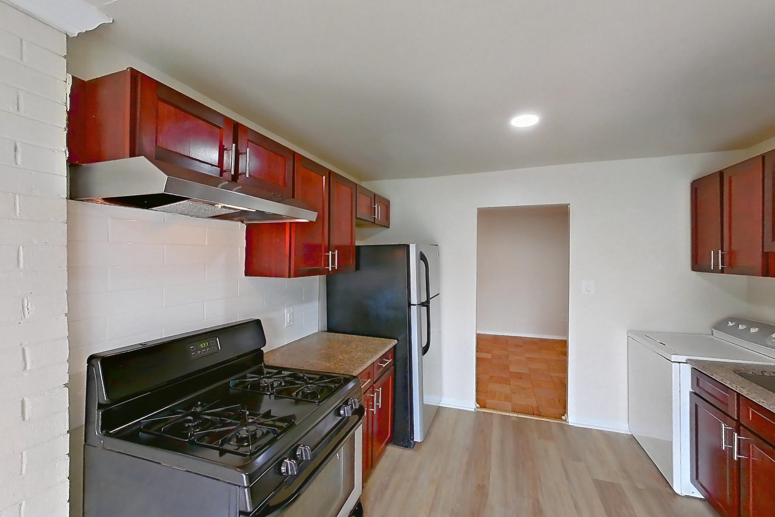 Kitchen in a Siberian floor plan apartment, representative of Apartment 9003BT23 at Franklin Park at Greenbelt Station