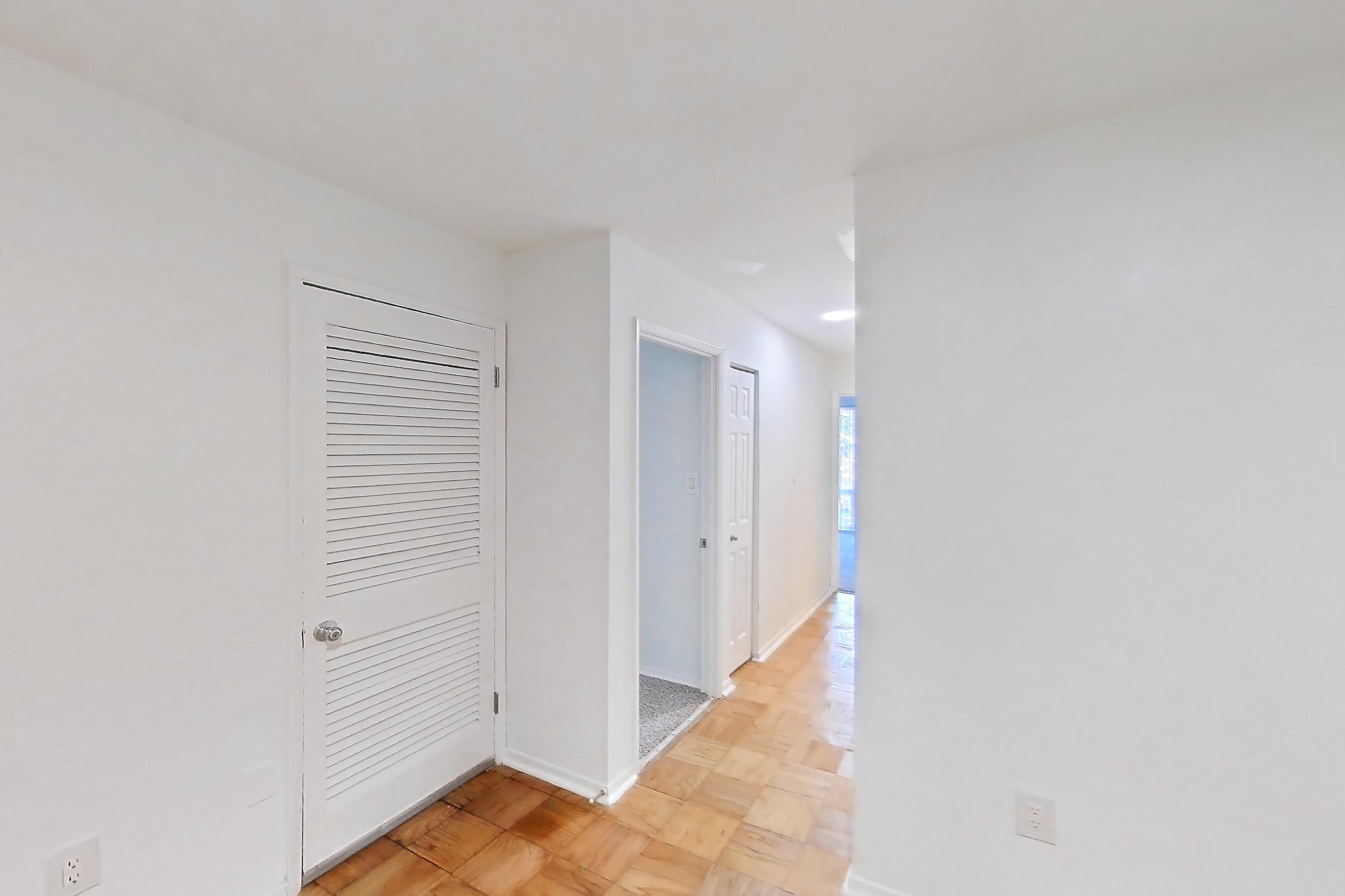 Dining room with light wood-finish flooring and parquet flooring, Apartment 5805CL33 at Franklin Park at Greenbelt Station