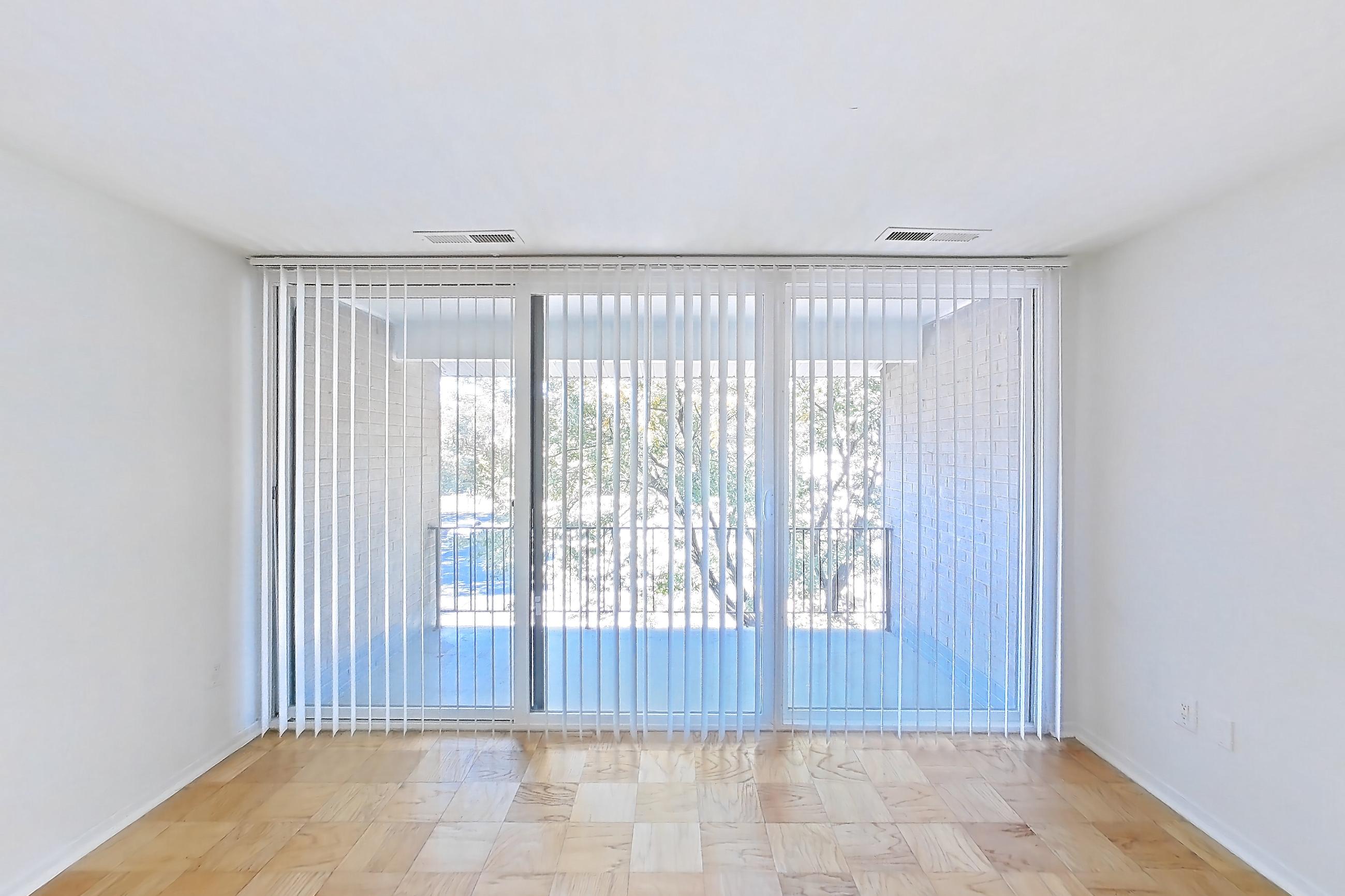 Living room with light wood-finish flooring and parquet flooring, Apartment 5805CL33 at Franklin Park at Greenbelt Station