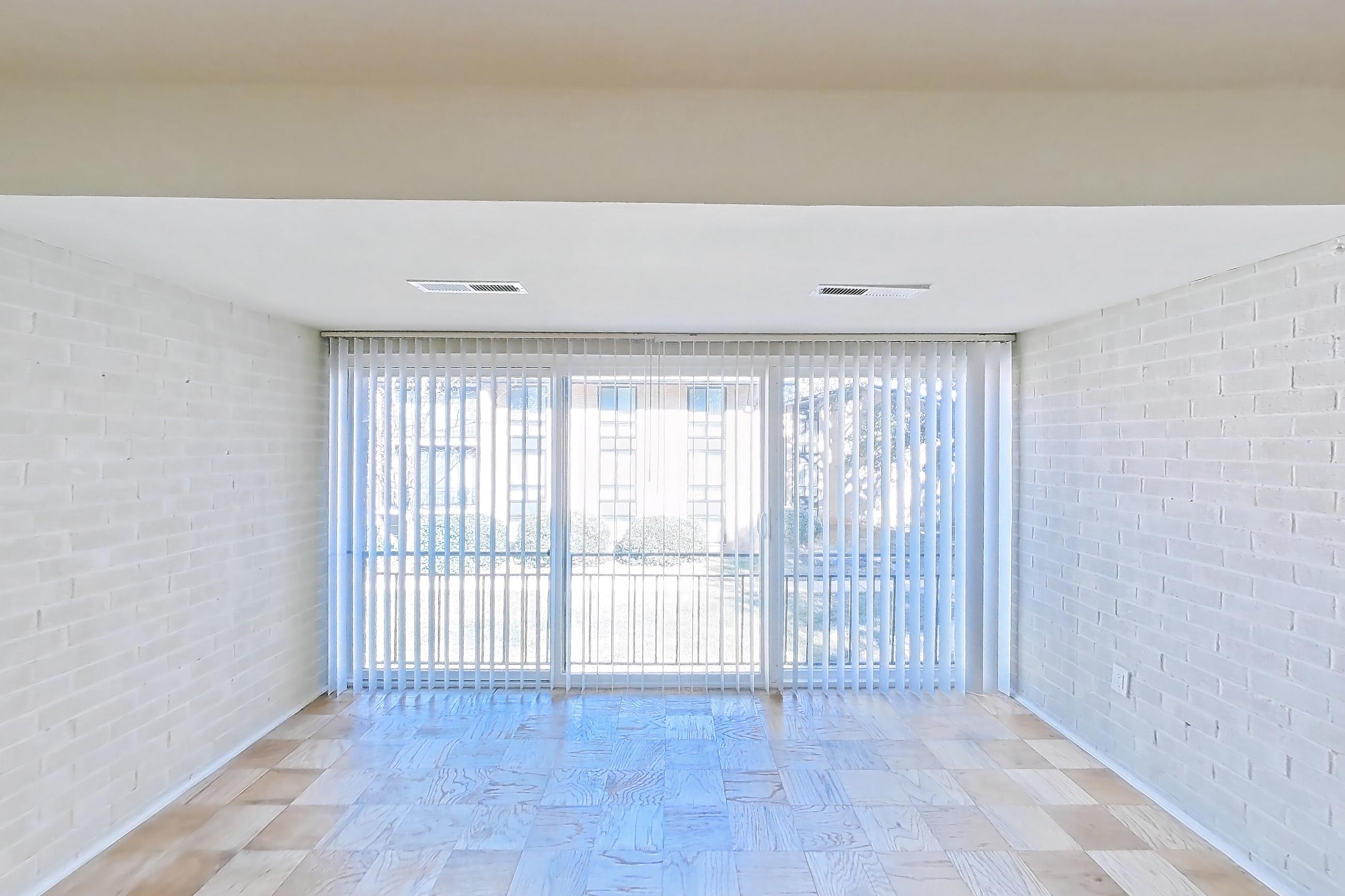 Living room with light wood-finish flooring and parquet flooring, Apartment 5813CL31 at Franklin Park at Greenbelt Station