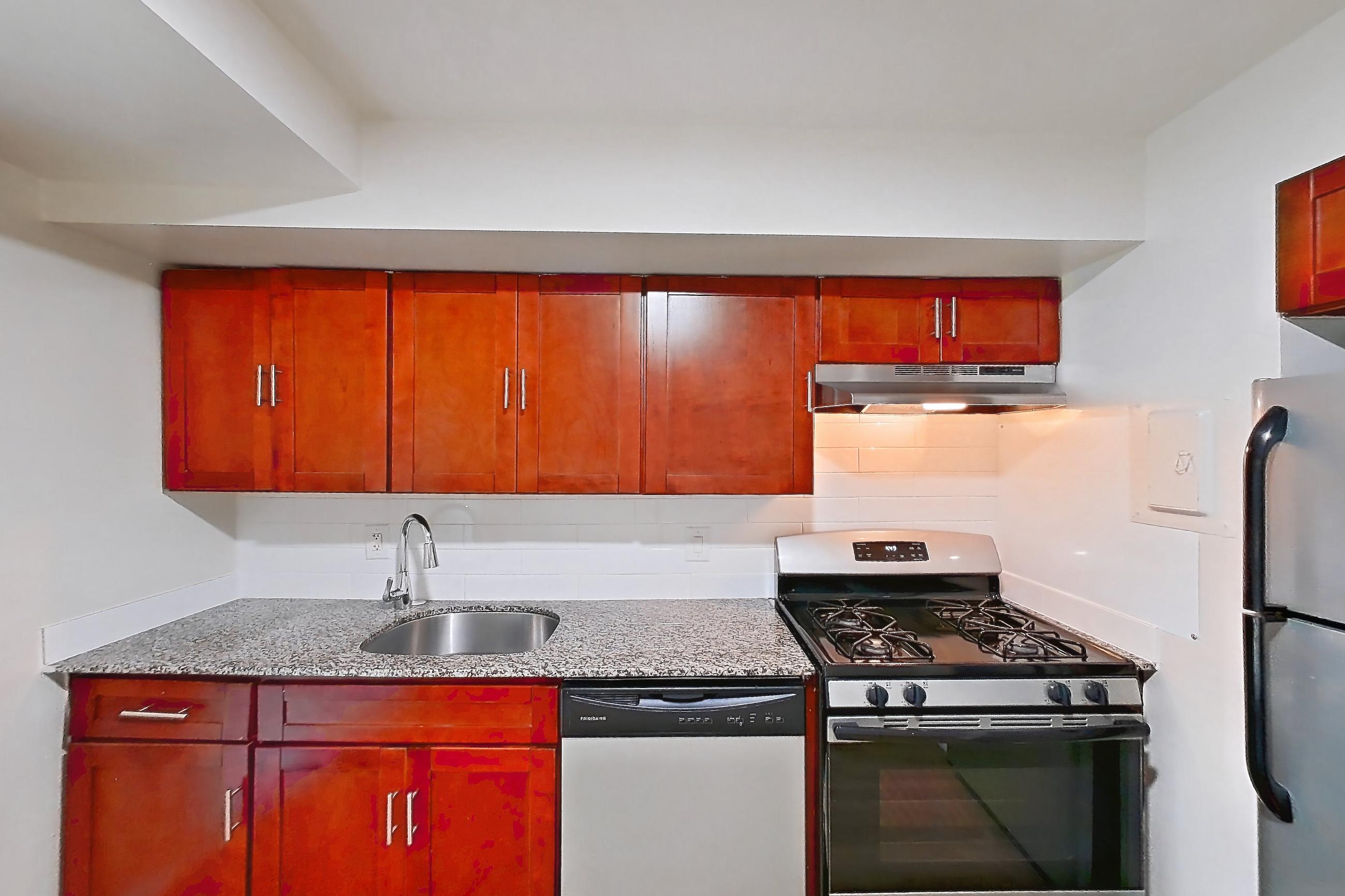Kitchen in a Geneva floor plan apartment, representative of Apartment 6002BD32 at Franklin Park at Greenbelt Station