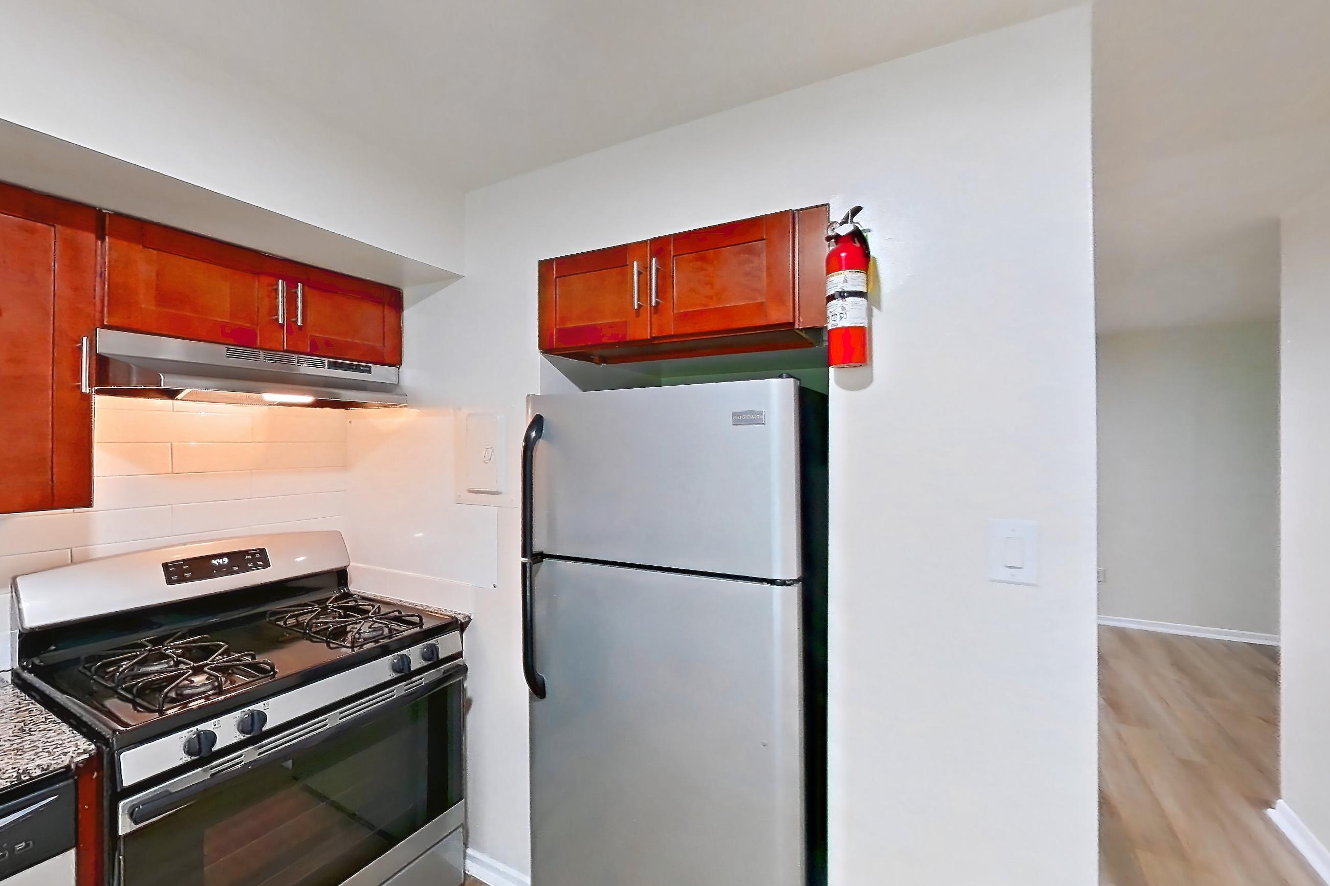 Kitchen in a Geneva floor plan apartment, representative of Apartment 6002BD32 at Franklin Park at Greenbelt Station
