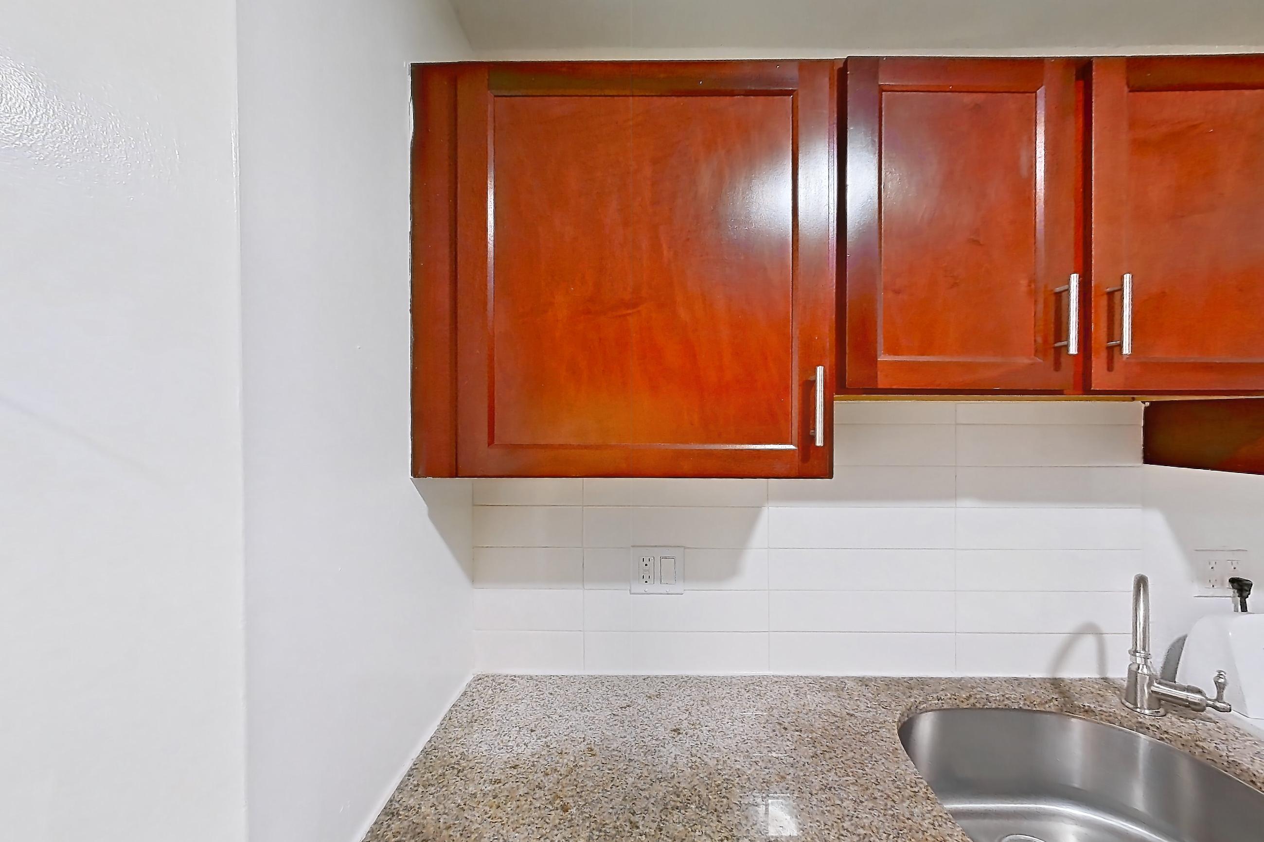 Kitchen in a Two Bedroom w/Washer and Dryer floor plan apartment, representative of Apartment 9310ER22 at Franklin Park at Greenbelt Station