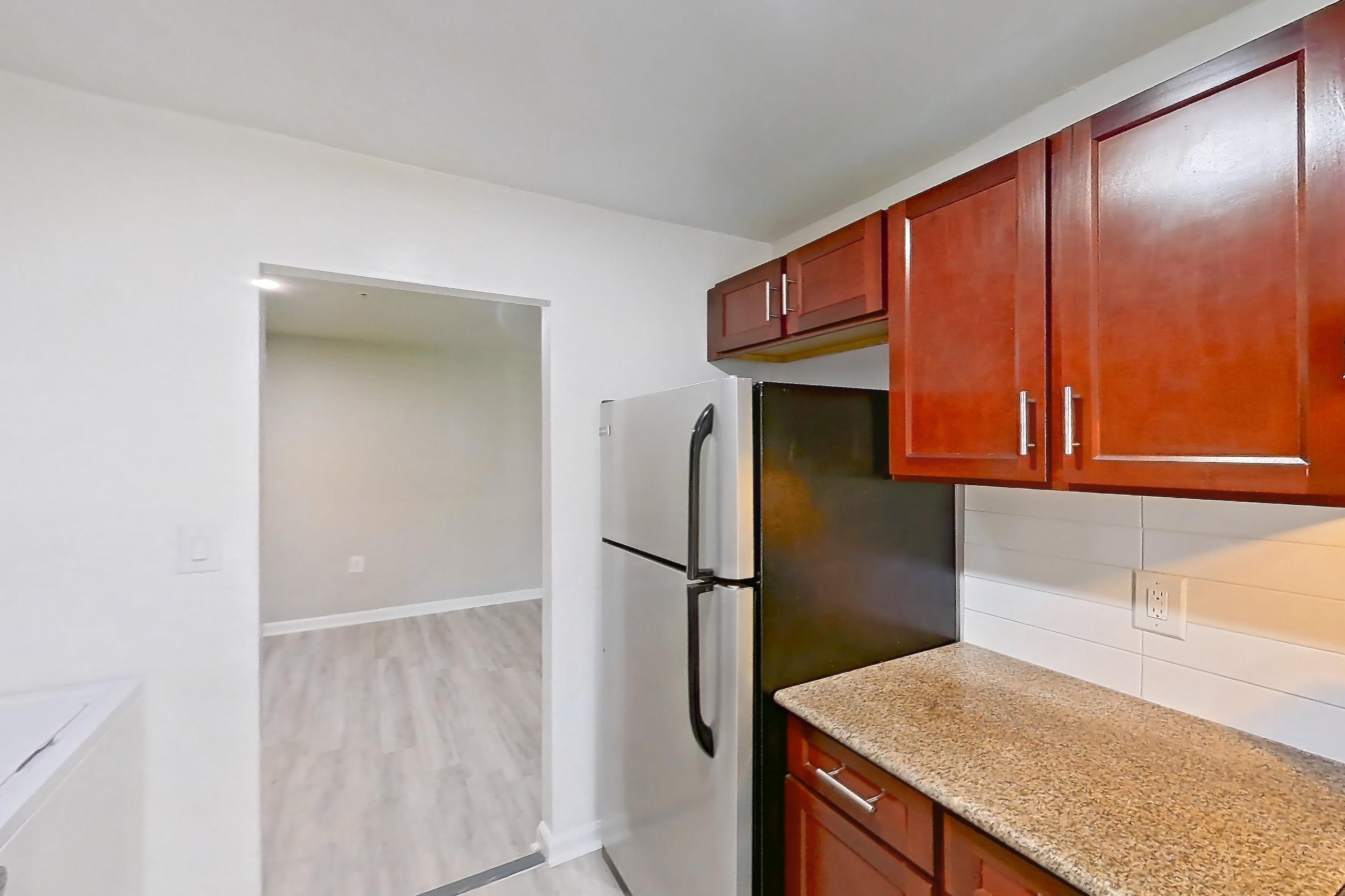 Kitchen in a Two Bedroom w/Washer and Dryer floor plan apartment, representative of Apartment 9310ER22 at Franklin Park at Greenbelt Station