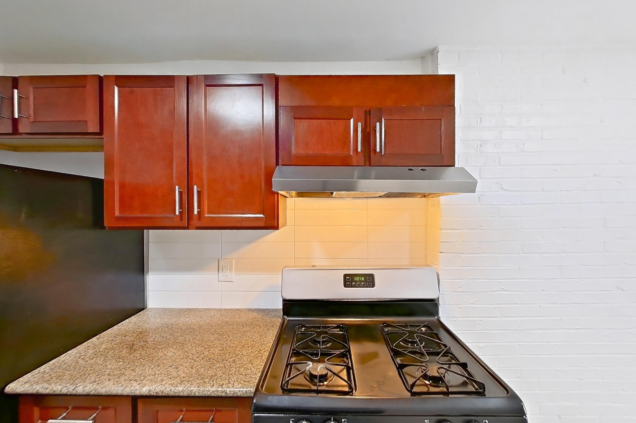 Kitchen in a Two Bedroom w/Washer and Dryer floor plan apartment, representative of Apartment 9310ER22 at Franklin Park at Greenbelt Station