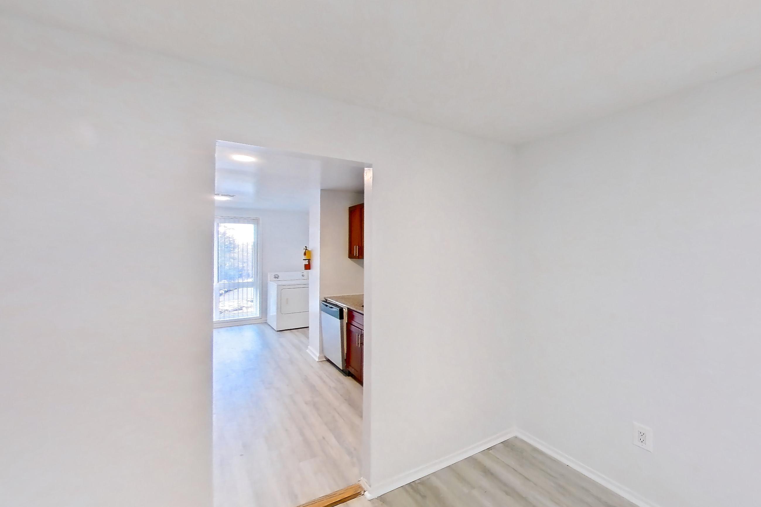 Dining room in a Bismark floor plan apartment, representative of Apartment 9000BT33 at Franklin Park at Greenbelt Station