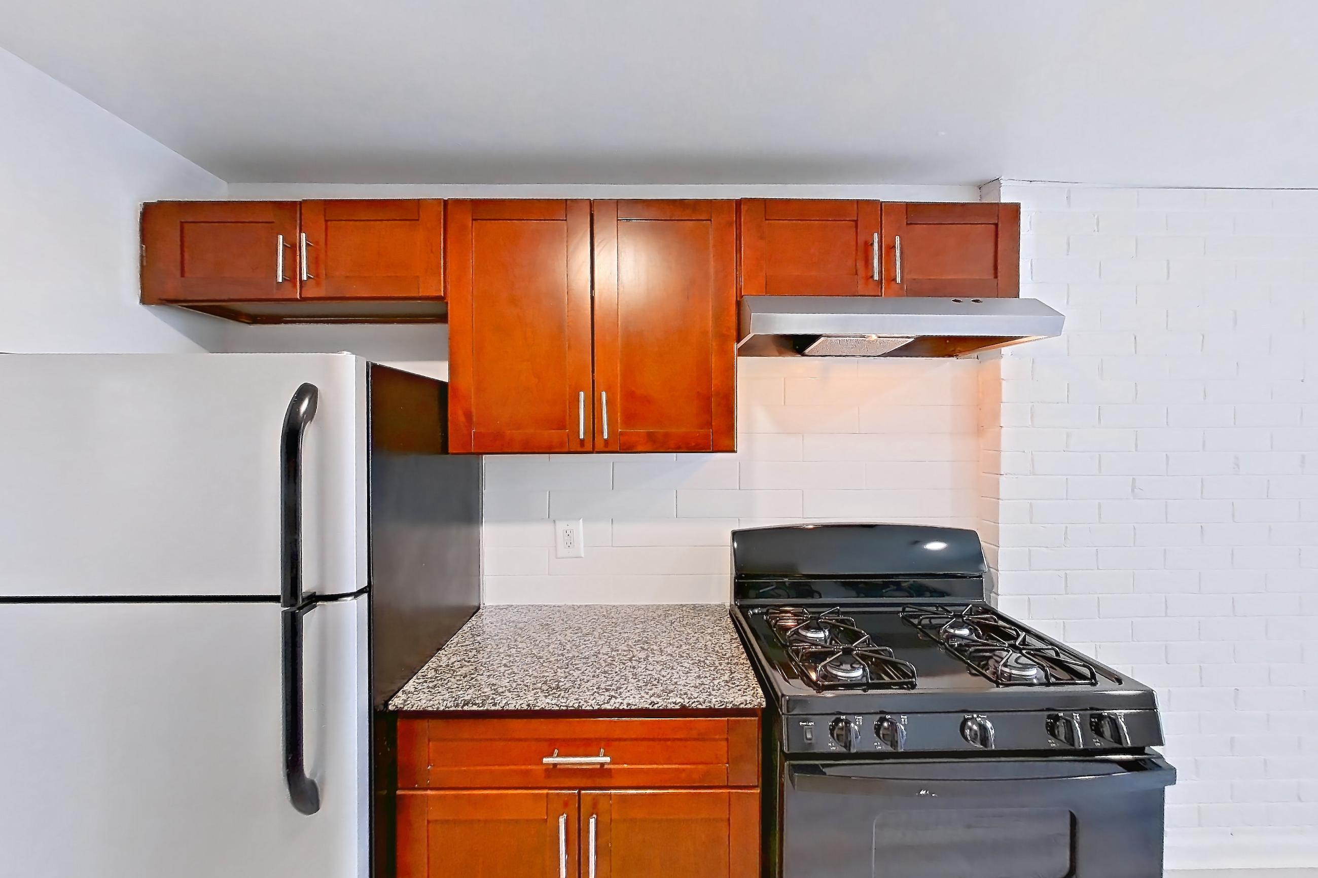Kitchen in a Bismark floor plan apartment, representative of Apartment 9000BT33 at Franklin Park at Greenbelt Station