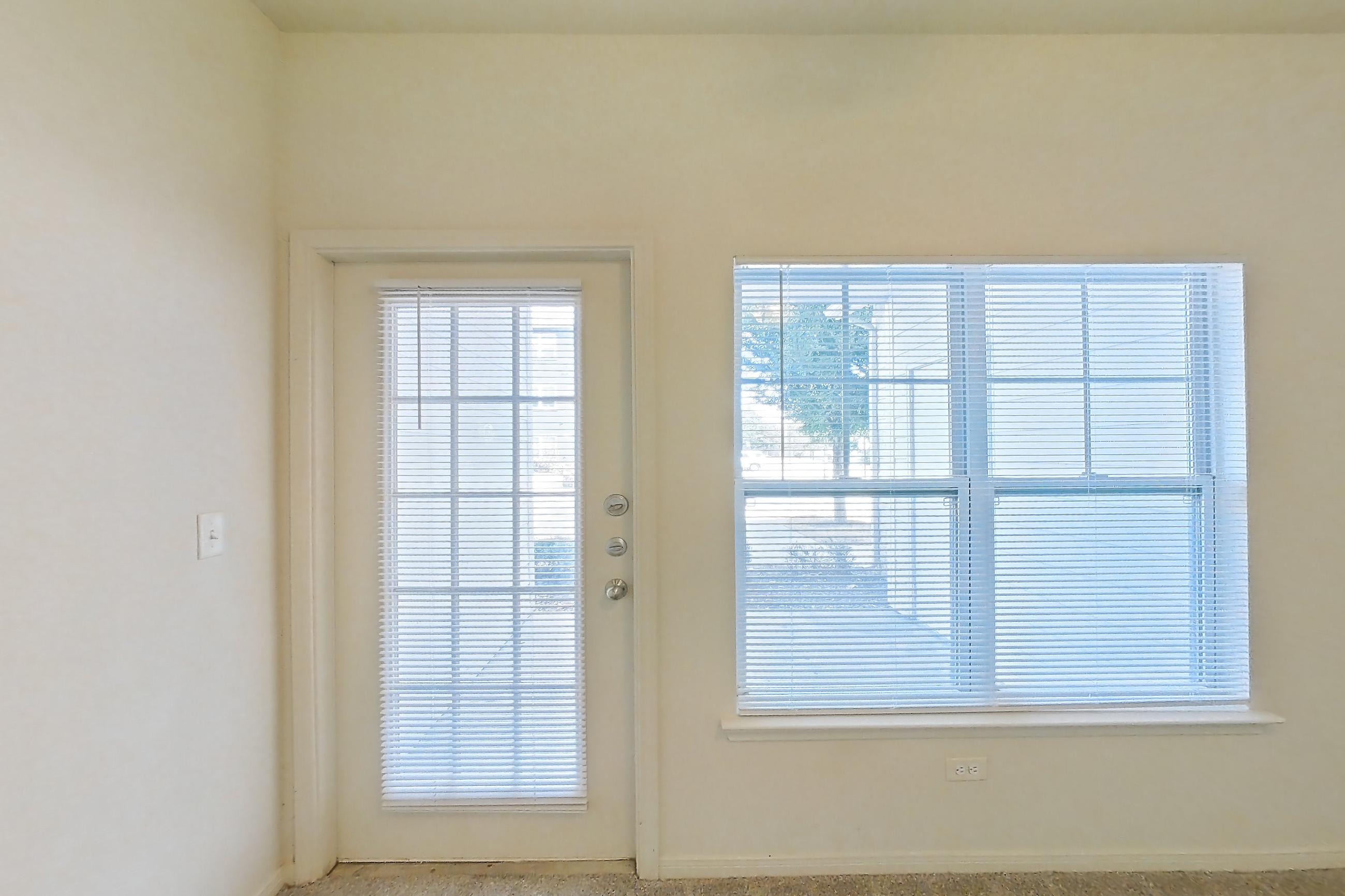 Living space with light carpet, Apartment 913 at Tuckaway