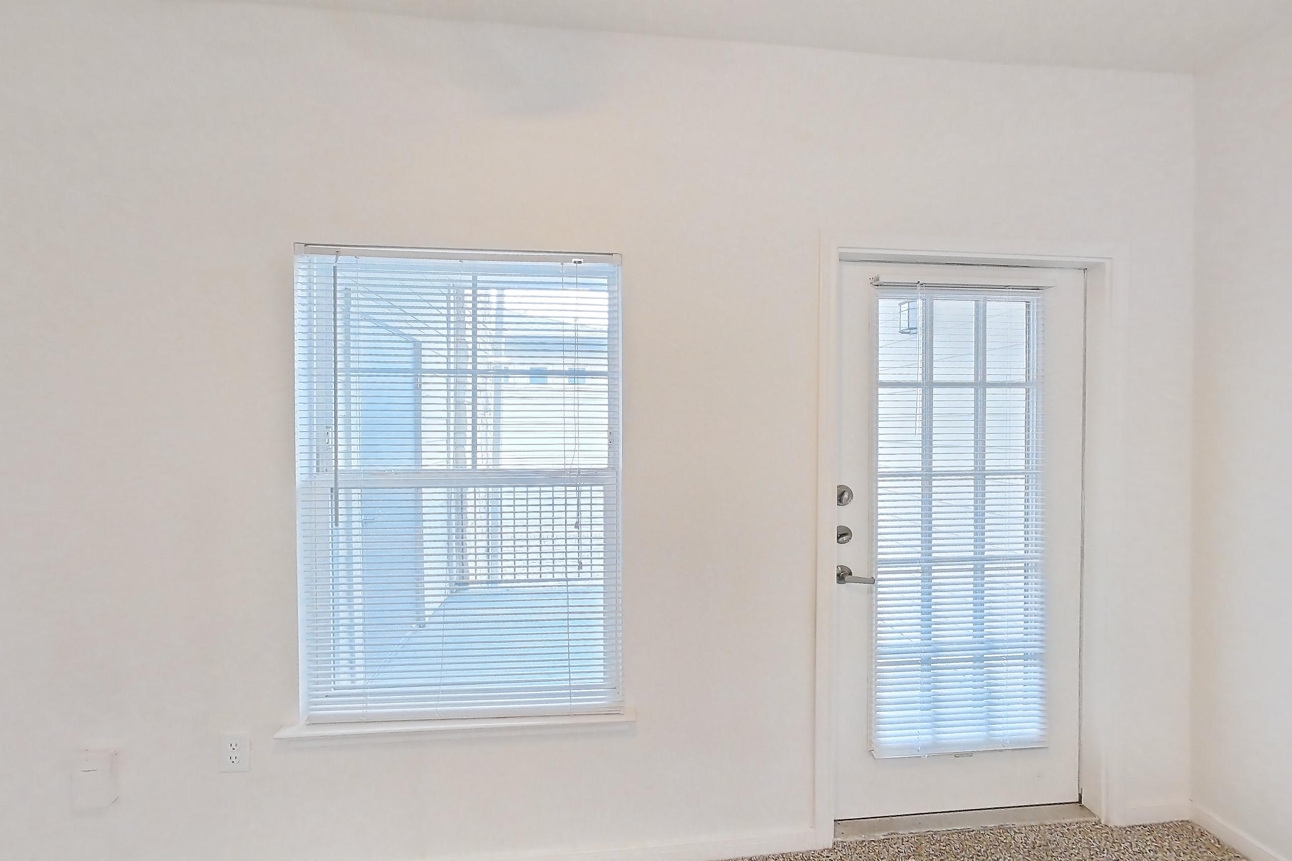 Living space with light carpet, Apartment 1204 at Oak Valley