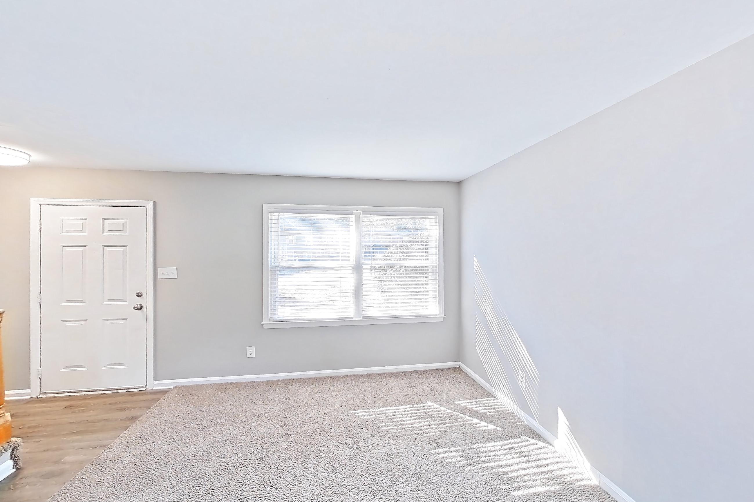 Living room, Apartment 1240G at Carriage House & Azalea