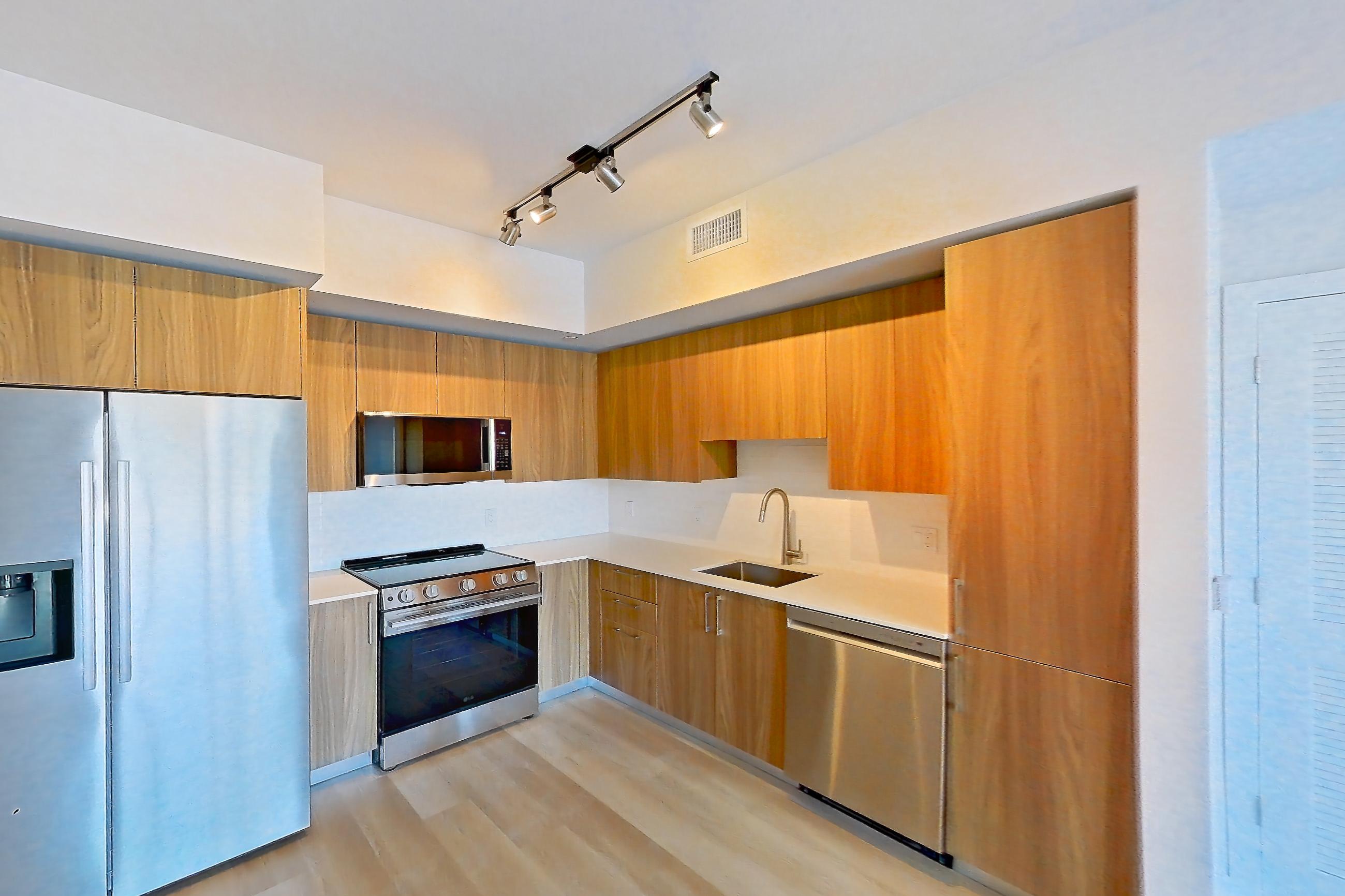 Living room, Apartment 110 at Lakeview at NoMi