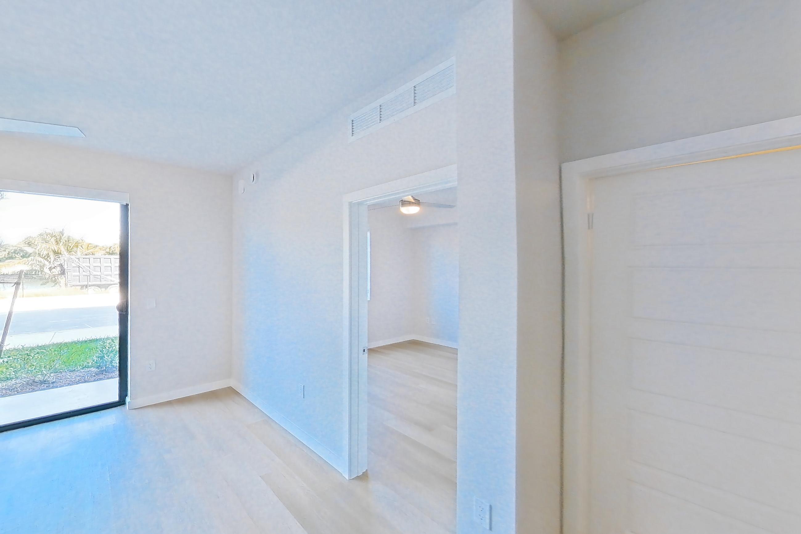 Living room, Apartment 110 at Lakeview at NoMi