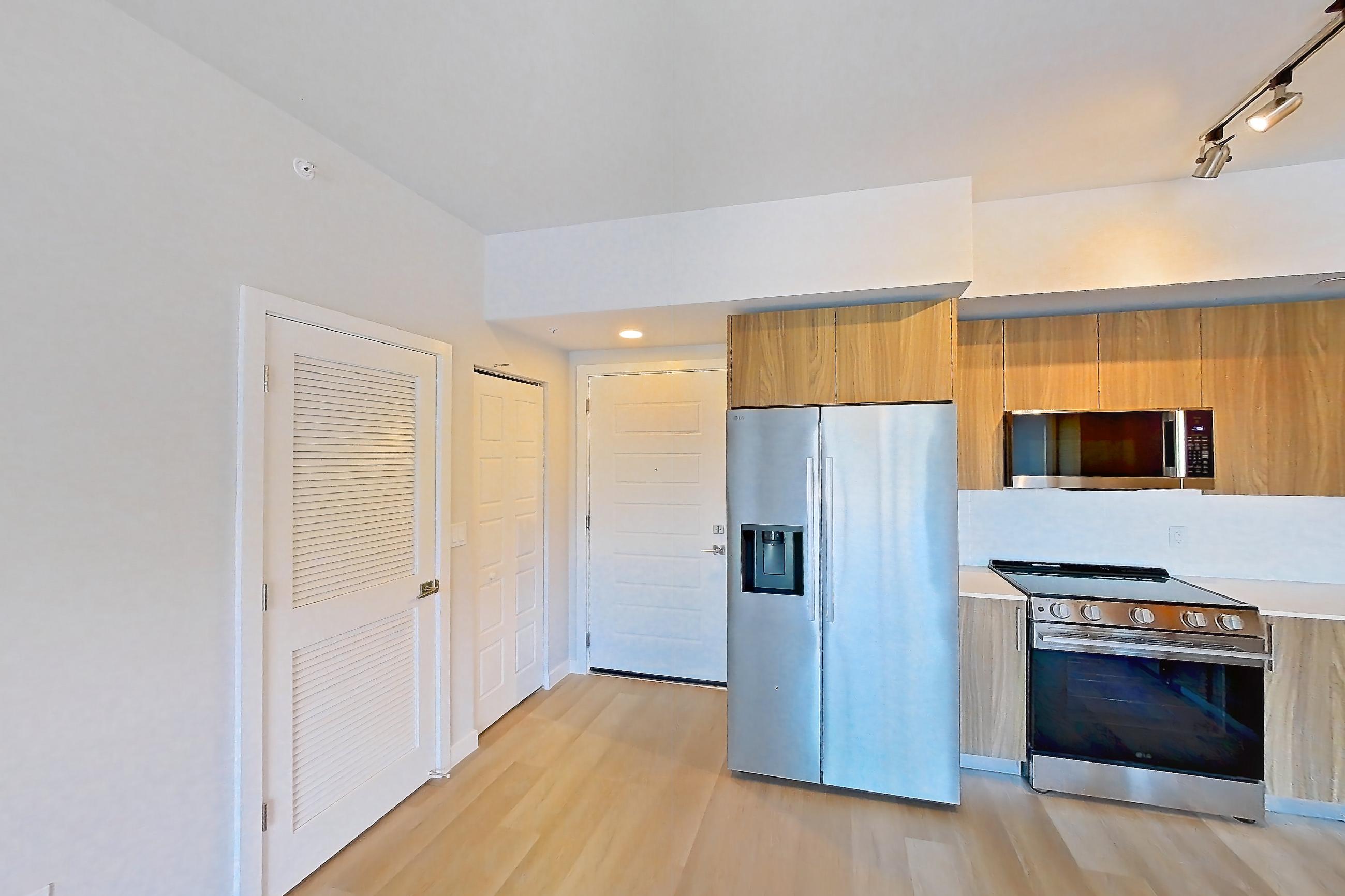 Living room, Apartment 110 at Lakeview at NoMi