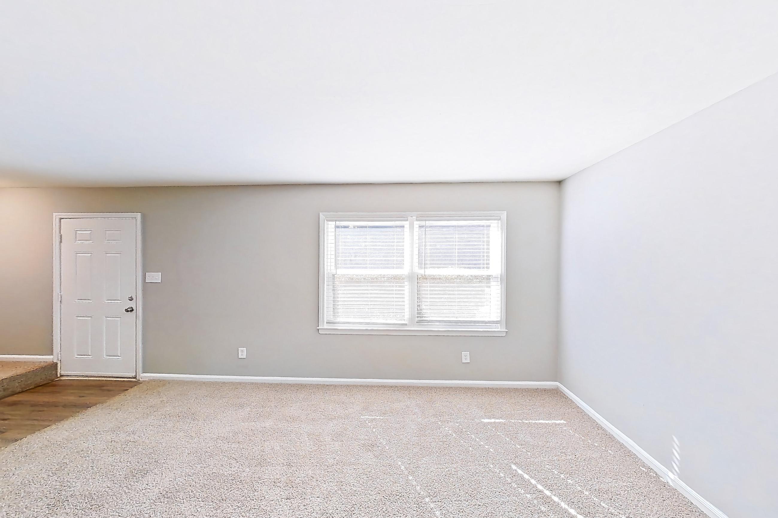 Living room, Apartment 1240K at Carriage House & Azalea