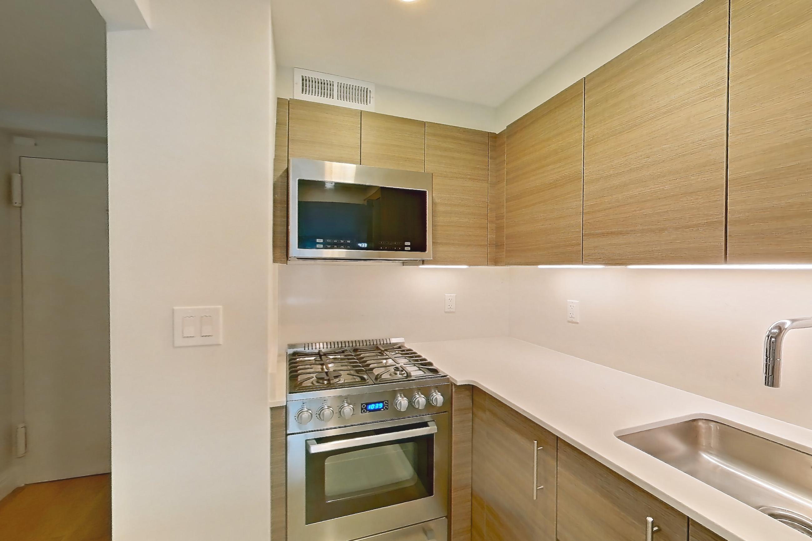 Kitchen, Apartment 8D at Stonehenge Leasing