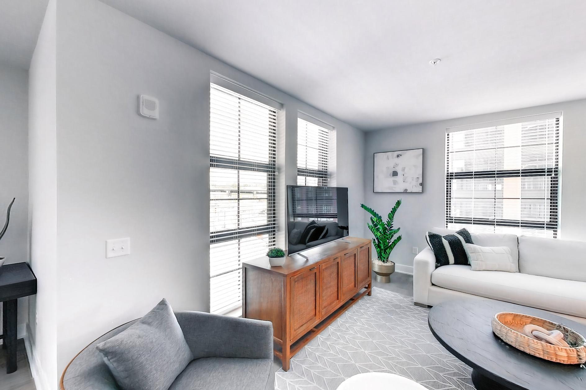 Dining room with dishwasher, electric range, light wood-finish flooring, microwave, oven/range, and stainless steel appliances, Apartment L3 Model at Rye House